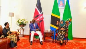 Tanzania President Samia Suluhu (R) speaks to Kenya's President William Ruto (C) and Kenya's First Lady Rachel Ruto in Dar es Salaam, Tanzania, on October 10. /State House Kenya handout